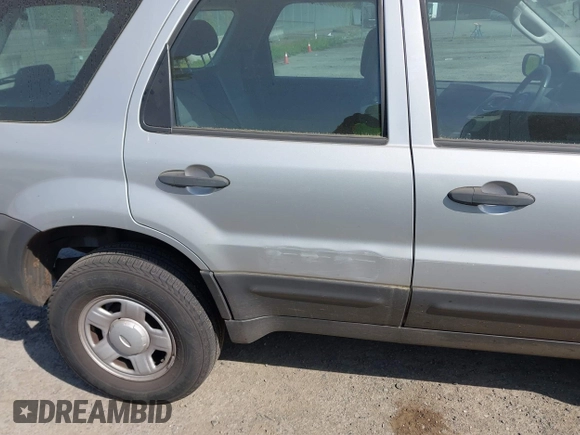 2006 Ford Escape XLS with VIN 1FMYU92Z46KD25072, listed as a IAAI auction lot 42132084 with 52,921 mi miles. Bid and sale history available at carsss.com. Image 6.