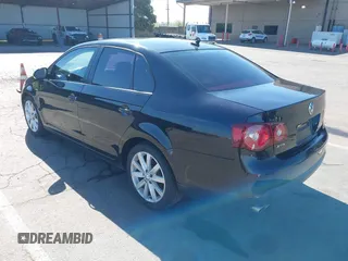 2010 Volkswagen Jetta Wolfsburg Edition with VIN 3VWRA7AJ8AM095259, listed as a IAAI auction lot 42190280 with 96,310 mi miles and . Bid and sale history available at DreamBid. Image 3.