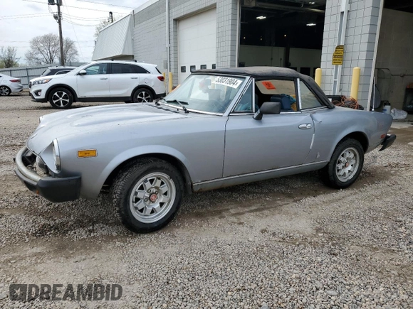 1980 FIAT 124 Spider z VIN 124CS000167543, wystawiony jako Copart lot #53031904 z przebiegiem 60 115 mil mil oraz Nie do naprawy • Non repairable. Historia ofert i sprzedaży dostępna na DreamBid. Obrazek 1.