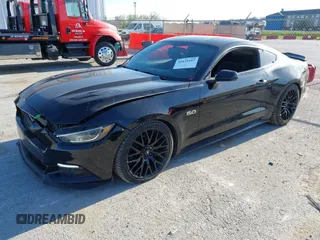 2015 Ford Mustang GT with VIN 1FA6P8CF4F5379607, listed as a IAAI auction lot 42039187 with 75,587 mi miles and . Bid and sale history available at carsss.com. Image 2.