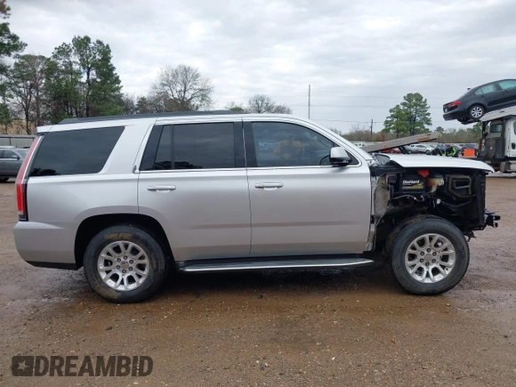2015 GMC Yukon SLT with VIN 1GKS1BKC7FR628736, listed as a IAAI auction lot 41709926 with 130,254 mi miles. Bid and sale history available at carsss.com. Image 14.
