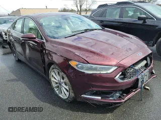 2017 Ford Fusion Titanium с VIN 3FA6P0D91HR173266, выставлен на аукционе Copart как лот 61439395 с пробегом 123 662 миль миль и Чистый • Clean title. История ставок и продаж доступна на DreamBid. Изображение 1.