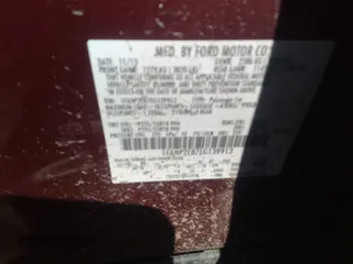 2014 Ford Taurus SEL with VIN 1FAHP2E87EG139913, listed as a IAAI auction lot 40216089 with 95,336 mi miles and . Bid and sale history available at carsss.com. Image 9.