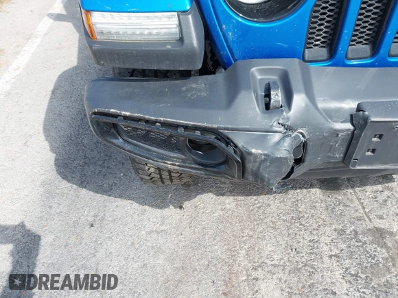 2023 Jeep Wrangler Sahara with VIN 1C4HJXEG4PW584800, listed as a IAAI auction lot 41908392 with 22,108 mi miles and . Bid and sale history available at DreamBid. Image 6.