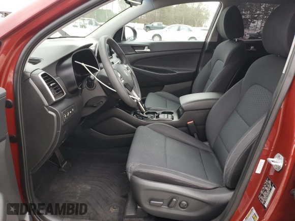 2019 Hyundai Tucson Sport with VIN KM8J33AL0KU875219, listed as a Copart auction lot 86816254 with 82,829 mi miles and Salvage Title. Bid and sale history available at carsss.com. Image 7.