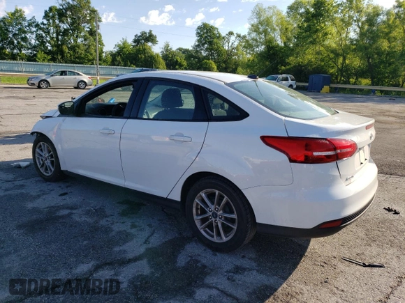 2017 Ford Focus SE with VIN 1FADP3F28HL309268, listed as a Copart auction lot 57995985 with 99,277 mi miles and Salvage title. Bid and sale history available at DreamBid. Image 2.