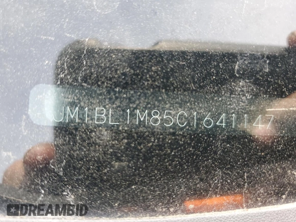 2012 Mazda 3 i Grand Touring with VIN JM1BL1M85C1641147, listed as a Copart auction lot 51715675 with 200,323 mi miles and Salvage Title. Bid and sale history available at DreamBid. Image 12.
