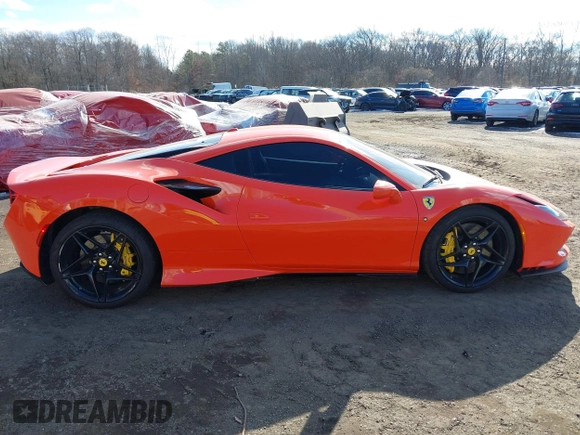 2021 Ferrari F8 z VIN ZFF92LLAXM0268231, wystawiony jako IAAI lot #41442929 z przebiegiem 6157 mil mil oraz . Historia ofert i sprzedaży dostępna na DreamBid. Obrazek 13.