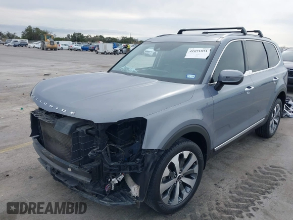 2020 Kia Telluride S with VIN 5XYP64HC9LG016294, listed as a IAAI auction lot 41691851 with 104,723 mi miles and . Bid and sale history available at DreamBid. Image 2.