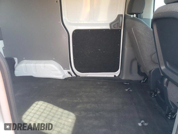 2016 Nissan NV200 S z VIN 3N6CM0KN1GK695339, wystawiony jako Copart lot #55224155 z przebiegiem 20 396 mil mil oraz Szkody całkowita. Historia ofert i sprzedaży dostępna na DreamBid. Obrazek 11.