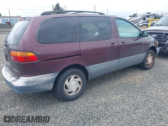 1999 Toyota Sienna LE with VIN 4T3ZF13C7XU152879, listed as a IAAI auction lot 41974953 with 201,644 mi miles. Bid and sale history available at carsss.com. Image 4.