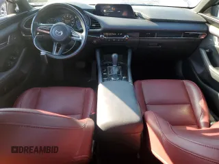 2023 Mazda 3 S Carbon Edition with VIN JM1BPBLM3P1616343, listed as a Copart auction lot 42303815 with 19,557 mi miles and Salvage title. Bid and sale history available at DreamBid. Image 8.
