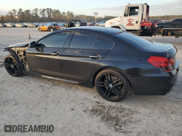 2014 BMW 6 Series 650i z VIN WBA6B2C53ED129256, wystawiony jako Copart lot #85346084 z przebiegiem 51 948 mil mil oraz Szkoda całkowita • Salvage title. Historia ofert i sprzedaży dostępna na DreamBid. Obrazek 2.
