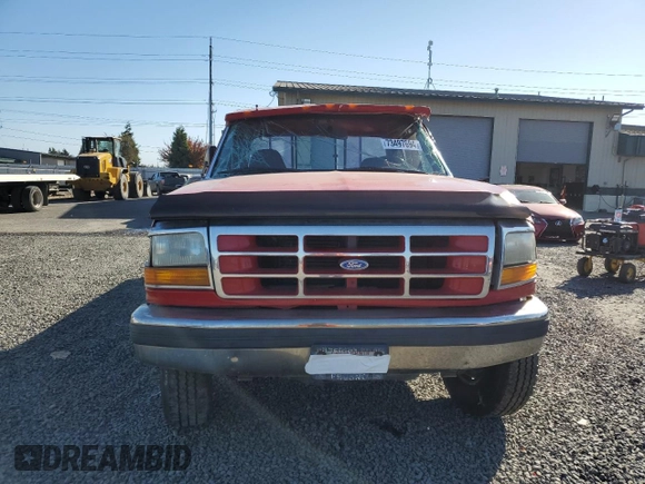 1994 Ford F-250 with VIN 1FTHX26F1RKB09056, listed as a Copart auction lot 73497694 with 0 mi miles and Salvage Title. Bid and sale history available at carsss.com. Image 5.