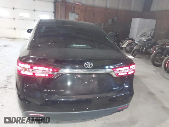 2014 Toyota Avalon Limited with VIN 4T1BK1EB0EU114093, listed as a IAAI auction lot 41311332 with 103,479 mi miles and . Bid and sale history available at DreamBid. Image 16.