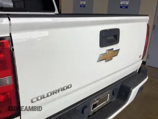 2016 Chevrolet Colorado 2WD LT with VIN 1GCGSCE31G1254592, listed as a IAAI auction lot 42808979 with 158,019 mi miles and . Bid and sale history available at DreamBid. Image 3.