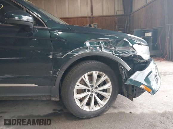 2018 Volkswagen Tiguan SEL with VIN 3VV2B7AX3JM133326, listed as a IAAI auction lot 42459190 with 94,665 mi miles and . Bid and sale history available at DreamBid. Image 6.