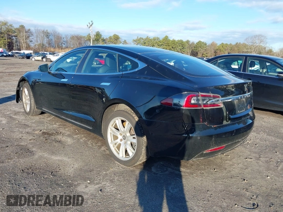 2020 Tesla Model S Long Range with VIN 5YJSA1E24LF413888, listed as a IAAI auction lot 41214903 with 42,711 mi miles and . Bid and sale history available at DreamBid. Image 3.