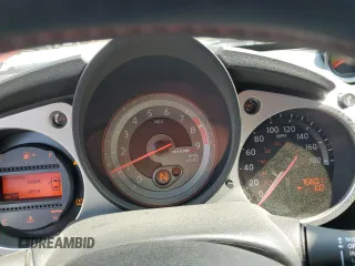 2013 Nissan 370Z Touring z VIN JN1AZ4EHXDM383169, wystawiony jako Copart lot #59787045 z przebiegiem 76 601 mil mil oraz Szkoda całkowita • Salvage title. Historia ofert i sprzedaży dostępna na DreamBid. Obrazek 9.