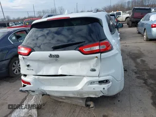 2018 Jeep Cherokee Overland with VIN 1C4PJMJX7JD594319, listed as a IAAI auction lot 41177860 with 128,925 mi miles. Bid and sale history available at carsss.com. Image 16.