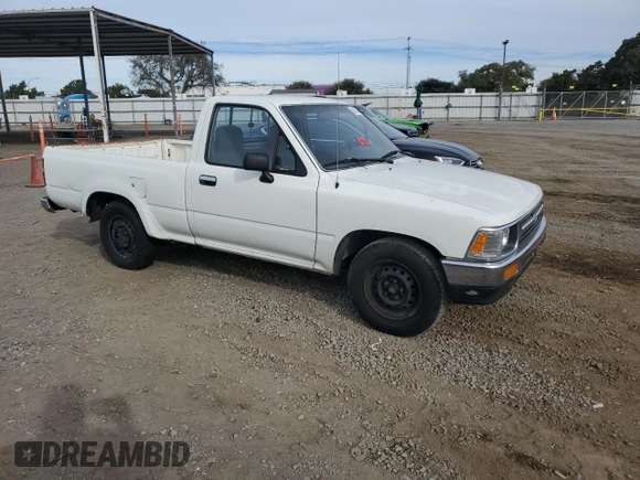 1993 Toyota Pickup DX with VIN JT4RN81P4P5168613, listed as a Copart auction lot 82611524 with 200,408 mi miles and Clean title. Bid and sale history available at DreamBid. Image 4.