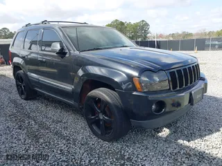 2005 Jeep Grand Cherokee Laredo with VIN 1J4GS48K05C511231, listed as a IAAI auction lot 41737924 with 179,411 mi miles. Bid and sale history available at carsss.com. Image 1.