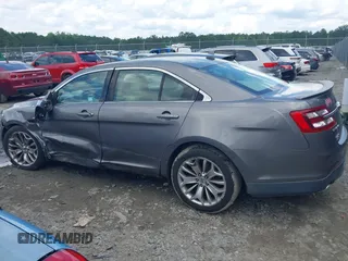 2013 Ford Taurus Limited z VIN 1FAHP2F88DG195677, wystawiony jako IAAI lot #42476918 z przebiegiem 197 732 mil mil oraz . Historia ofert i sprzedaży dostępna na DreamBid. Obrazek 14.