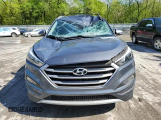 2017 Hyundai Tucson Limited z VIN KM8J3CA25HU391188, wystawiony jako Copart lot #55727215 z przebiegiem 56 616 mil mil oraz Szkoda całkowita • Salvage title. Historia ofert i sprzedaży dostępna na DreamBid. Obrazek 5.