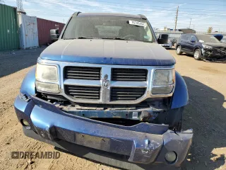 2009 Dodge Nitro SE z VIN 1D8GT28KX9W530723, wystawiony jako Copart lot #76746494 z przebiegiem 209 817 mil mil oraz Szkoda całkowita • Salvage title. Historia ofert i sprzedaży dostępna na DreamBid. Obrazek 5.