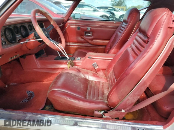 1978 Pontiac Firebird с VIN 2U87K8L123850, выставлен на аукционе Copart как лот 79076374 с пробегом 64 829 миль миль и Списание • Salvage title. История ставок и продаж доступна на DreamBid. Изображение 7.