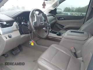 2018 GMC Yukon SLT with VIN 1GKS1BKC3JR279163, listed as a IAAI auction lot 40973940 with 122,445 mi miles. Bid and sale history available at carsss.com. Image 5.