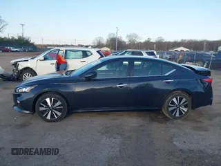 2021 Nissan Altima SV with VIN 1N4BL4DV5MN410885, listed as a IAAI auction lot 41809083 with 61,362 mi miles and . Bid and sale history available at DreamBid. Image 14.