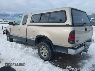 1998 Ford F-150 z VIN 1FTZX18W5WKB97701, wystawiony jako IAAI lot #41254873 z przebiegiem 291 523 mil mil oraz . Historia ofert i sprzedaży dostępna na DreamBid. Obrazek 3.