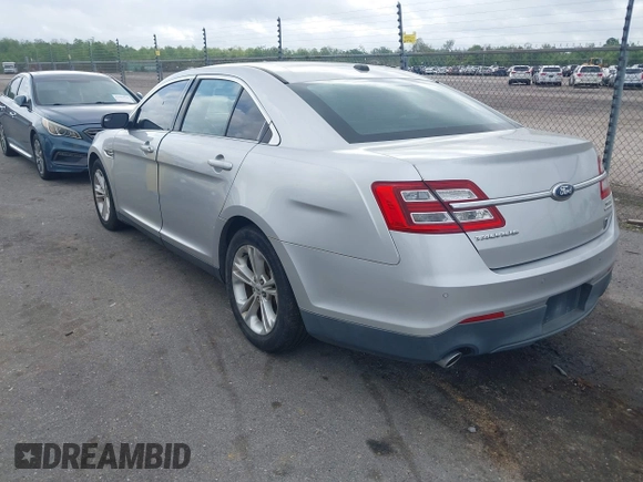2013 Ford Taurus SEL with VIN 1FAHP2E81DG129229, listed as a IAAI auction lot 41898917 with 205,865 mi miles. Bid and sale history available at carsss.com. Image 3.
