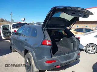 2017 Jeep Cherokee Trailhawk L Plus with VIN 1C4PJMBBXHW634944, listed as a IAAI auction lot 41022673 with 116,542 mi miles. Bid and sale history available at carsss.com. Image 3.