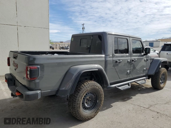 2023 Jeep Gladiator Mojave z VIN 1C6JJTEG7PL548084, wystawiony jako Copart lot #52827265 z przebiegiem 26 789 mil mil oraz Czysty tytuł • Clean title. Historia ofert i sprzedaży dostępna na DreamBid. Obrazek 3.