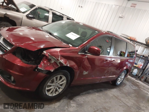 2019 Dodge Grand Caravan SXT with VIN 2C4RDGCG9KR678235, listed as a IAAI auction lot 41864931 with 127,848 mi miles and . Bid and sale history available at DreamBid. Image 14.