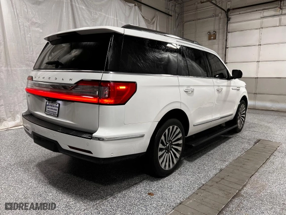 2021 Lincoln Navigator Reserve with VIN 5LMJJ2LT4MEL11001, listed as a Copart auction lot 54712665 with 34,120 mi miles and Clean Title. Bid and sale history available at carsss.com. Image 4.