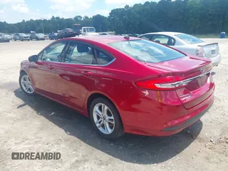 2018 Ford Fusion SE with VIN 3FA6P0HD7JR258701, listed as a IAAI auction lot 42637023 with 150,471 mi miles and . Bid and sale history available at DreamBid. Image 3.