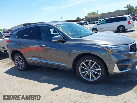 2020 Acura RDX Technology with VIN 5J8TC2H53LL014852, listed as a IAAI auction lot 39360410 with 61,341 mi miles and . Bid and sale history available at DreamBid. Image 13.