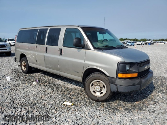 2004 Chevrolet Express Passenger with VIN 1GAHG39U741128458, listed as a Copart auction lot 64436215 with 118,387 mi miles and Salvage title. Bid and sale history available at DreamBid. Image 4.