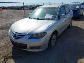 2007 Mazda 3 S Touring with VIN JM1BK323771729466, listed as a IAAI auction lot 42254581 with 112,733 mi miles and . Bid and sale history available at DreamBid. Image 2.