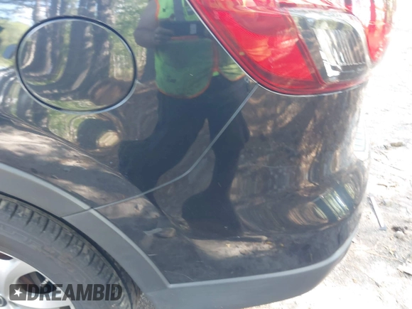 2014 Mazda CX-9 Touring with VIN JM3TB3CV1E0428688, listed as a IAAI auction lot 42052151 with 208,050 mi miles and . Bid and sale history available at DreamBid. Image 6.
