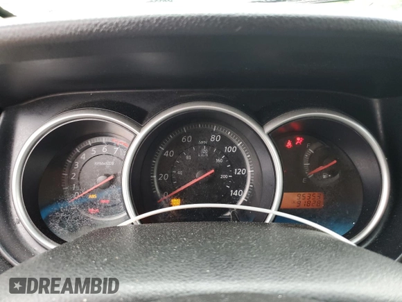 2010 Nissan Versa S z VIN 3N1BC1AP9AL418100, wystawiony jako Copart lot #57971985 z przebiegiem 95 353 mil mil oraz Szkoda całkowita • Salvage title. Historia ofert i sprzedaży dostępna na DreamBid. Obrazek 9.