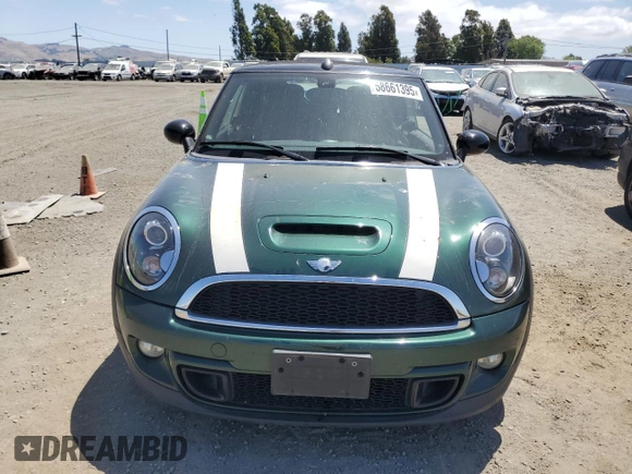 2013 MINI Convertible S с VIN WMWZP3C52DT705167, выставлен на аукционе Copart как лот 58661395 с пробегом 93 205 миль миль и Чистый • Clean title. История ставок и продаж доступна на DreamBid. Изображение 5.