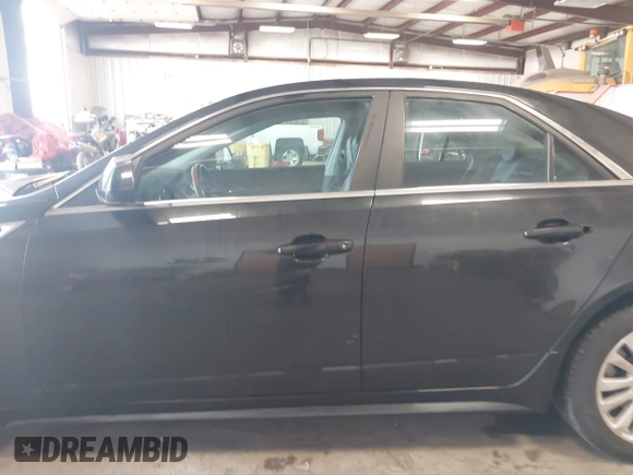 2011 Cadillac CTS Performance with VIN 1G6DL5ED6B0131490, listed as a IAAI auction lot 41980231 with 75,040 mi miles and . Bid and sale history available at DreamBid. Image 15.