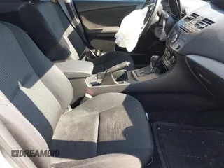 2013 Mazda 3 i Touring z VIN JM1BL1LP2D1742494, wystawiony jako IAAI lot #42186275 z przebiegiem 150 046 mil mil oraz . Historia ofert i sprzedaży dostępna na DreamBid. Obrazek 5.