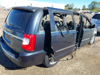 2014 Chrysler Town & Country Touring with VIN 2C4RC1BGXER112283, listed as a IAAI auction lot 40593456 with Not Provided miles and . Bid and sale history available at DreamBid. Image 4.