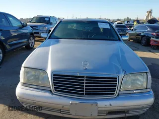 1996 Mercedes-Benz S 320 with VIN WDBGA32E9TA307279, listed as a IAAI auction lot 41631747 with 189,048 mi miles and . Bid and sale history available at DreamBid. Image 12.