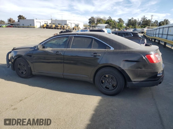 2013 Ford Police Interceptor with VIN 1FAHP2M81DG143522, listed as a Copart auction lot 51243995 with 303,703 mi miles and Salvage title. Bid and sale history available at DreamBid. Image 2.
